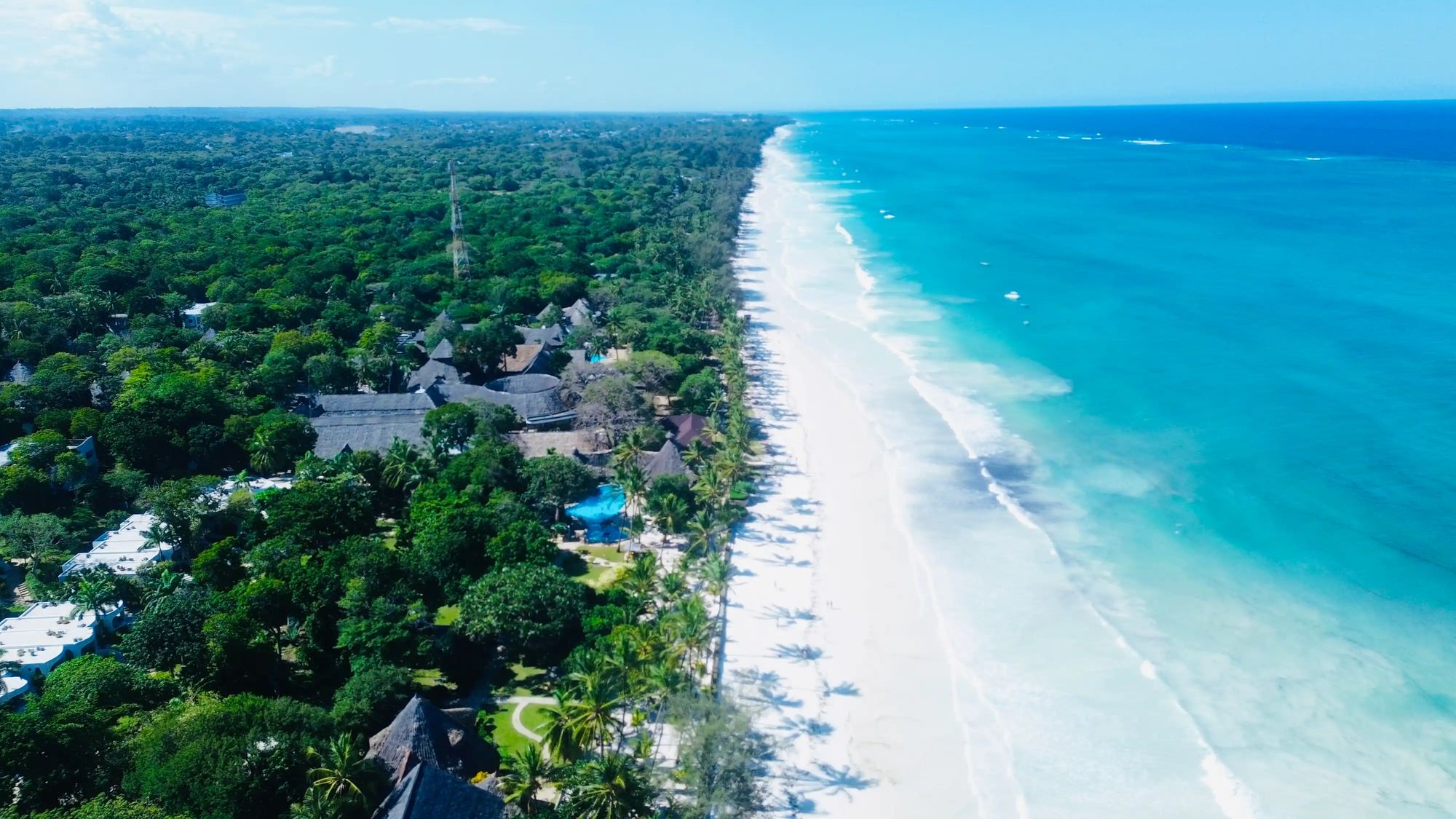 Drone view of Diani Beach, white sand and turquoise water