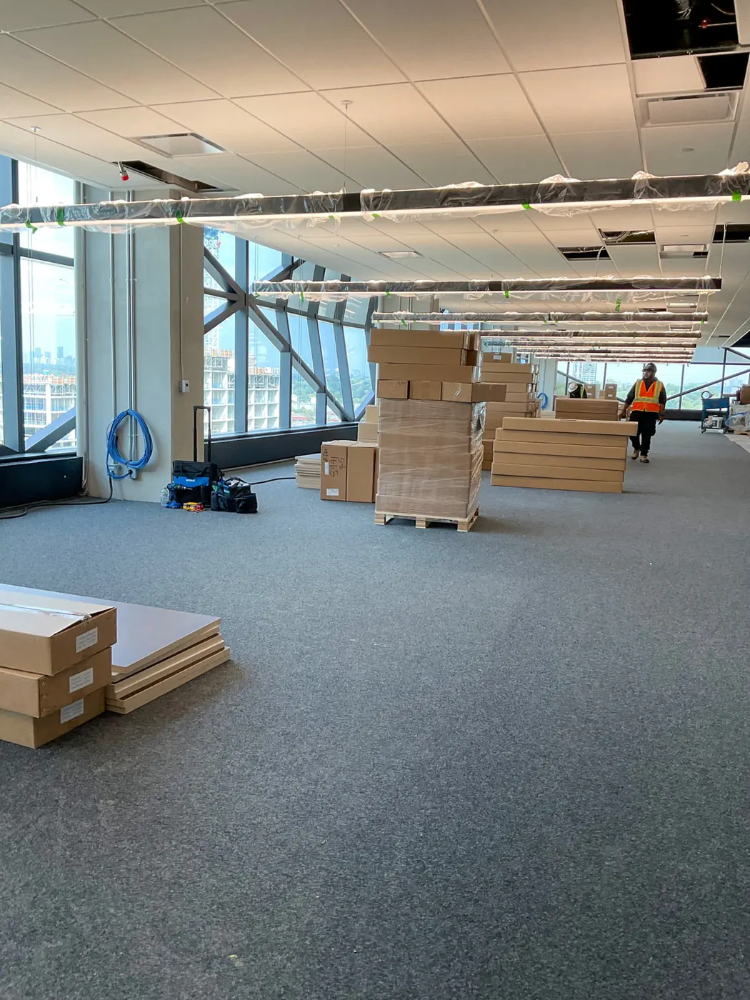 An ECS install in progress: a new floor with crated furniture waiting to be assembled
