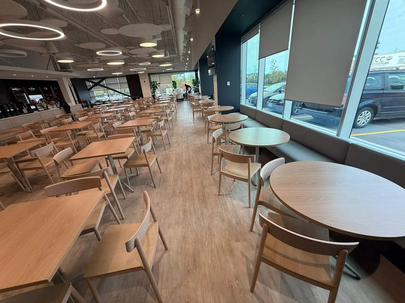 MDA project, café with rows of wooden tables