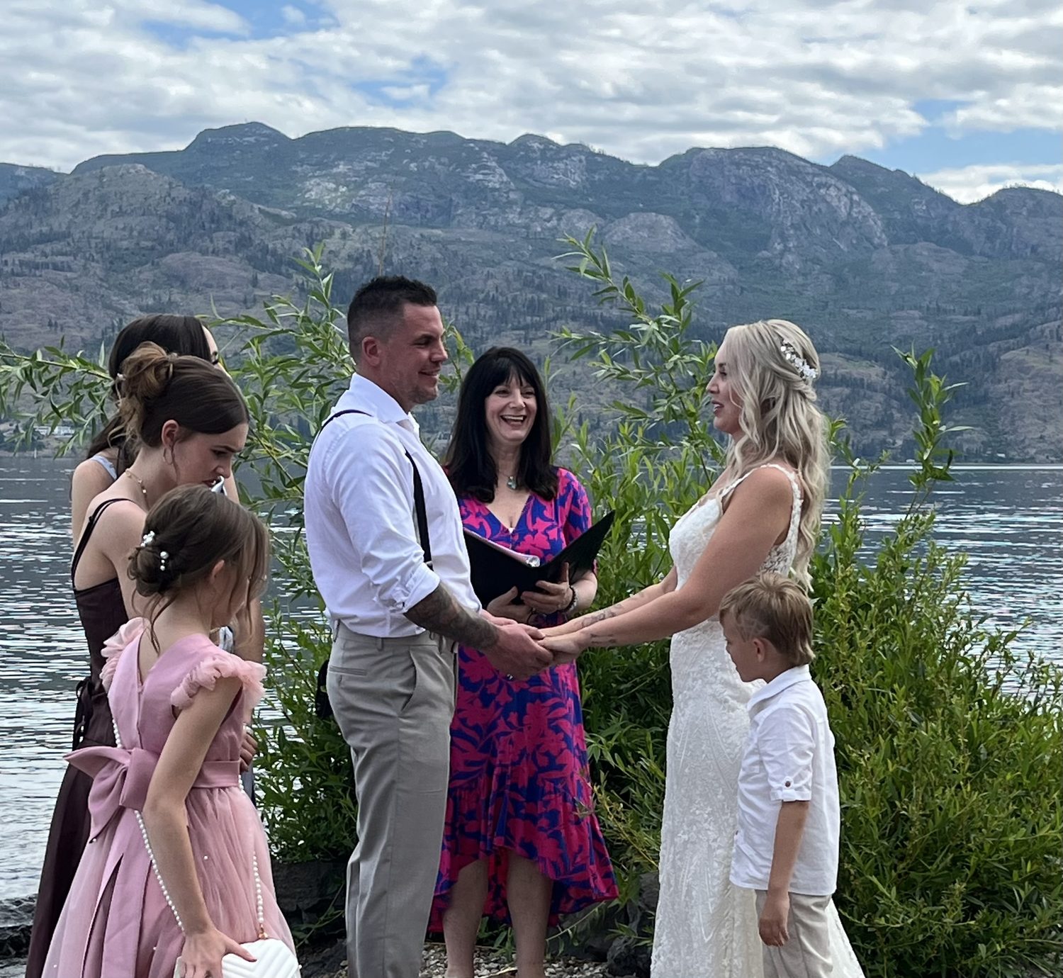 Lakeside ceremony with children