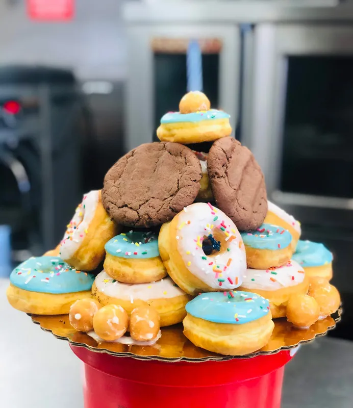 A celebration tower of Winstar donuts and cookies